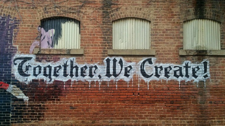 Together We Create wall graffiti